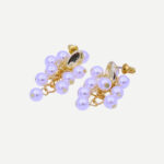Pearl Pop chique oorbellen met opvallende glanzende parel en gouden details