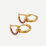Rose Spark Gouden oorbellen met ovale roze zirconia in gouden omlijsting Stainless Steel 2025